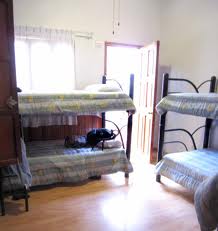 Four sharing room at Swarnaa Ladies Hostel with two bunk beds